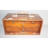 A portable specimen/instrument case, fitted four drawers, 17" wide