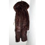 A musquash fur coat by the National Fur Company, back 39", and a mink stole