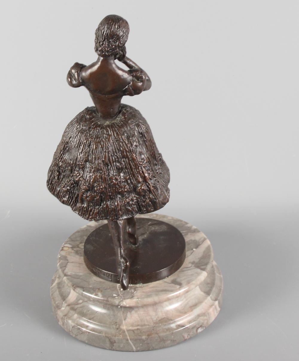 T Merrifield: a bronze sculpture of a ballerina on points, limited edition 55/150, on circular - Image 2 of 4