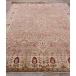 A modern Persian rug with all-over Herati design in shades of brown, cream and red, 96" x 126"