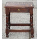 A 17th Century style oak rectangular occasional table, fitted one drawer, on turned supports, 20"