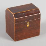 A George III mahogany and box line inlaid tea caddy with canted top, 5" wide