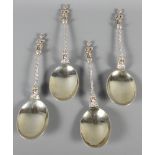 Four continental silver spoons with figure decorated handles