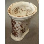 A Victorian brown floral transfer decorated "Progress Wash Down Water Closet"