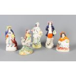 A 19th Century Staffordshire figure group, Old Mother Goose, a similar figure, drummer boy, fruit