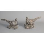 A pair of filled silver pheasant models