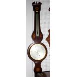 A 19th Century syphon tube barometer in mahogany case inlaid shell and paterae, silvered register