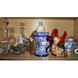 A Goebel figure of a seated child reading a book, a Doulton Burslem blue and white jug, a Medina