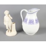 A Parian spill vase, in the form of a young traveller, (hairline crack) and a late Victorian