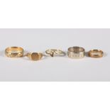Three 9ct gold wedding bands, a 9ct gold signet ring and a 9ct gold dress ring, 14.3g approx