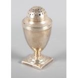 A silver muffineer, on weighted base, London 1801