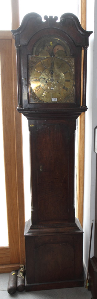 An early 19th Century oak long case clock with eight-day striking movement by Maurice Thomas
