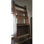 A 19th Century mahogany waterfall bookcase, fitted three open shelves o