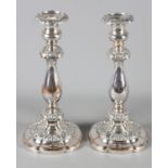 A pair of old Sheffield plate candlesticks, 10 1/2" high