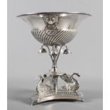 A continental white metal tazza, on swan decorated base, and a continental white metal spoon, a