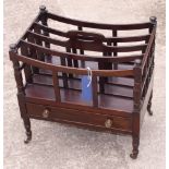 A 19th Century mahogany Canterbury, fitted drawer, on turned and castored supports