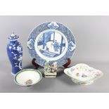 A Chinese blue and white figure decorated charger, two Chinese bowls, one with black underside and