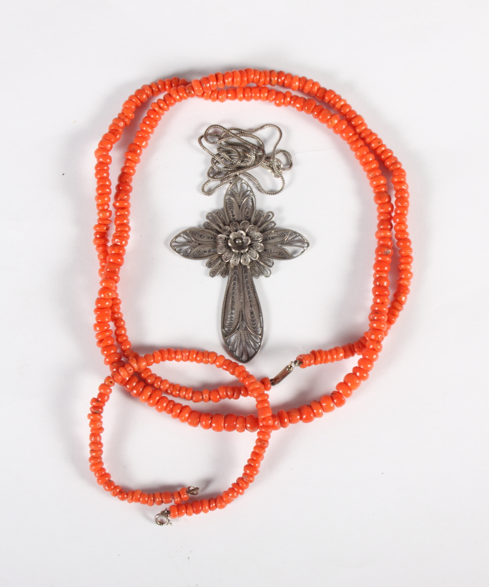 A late 19th Century coral bead necklace with silver barrel clasp, a similar bracelet and a