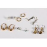 A small selection of gold and other earrings