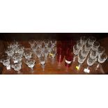 Three collections of Victorian cut wine glasses and a set of six Victorian cranberry glasses