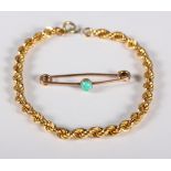 A gold and turquoise set bar brooch and an 18ct gold bracelet (a/f)