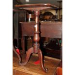 A 19th Century mahogany rectangular top occasional table, on turned column and tripod splay