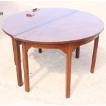 A pair of 19th Century mahogany semicircular tables, on ogee square supports, 48" dia (both tables