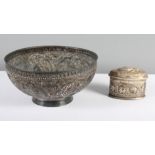 A Burmese embossed silver bowl and a similar oval box and cover, 8.5oz approx