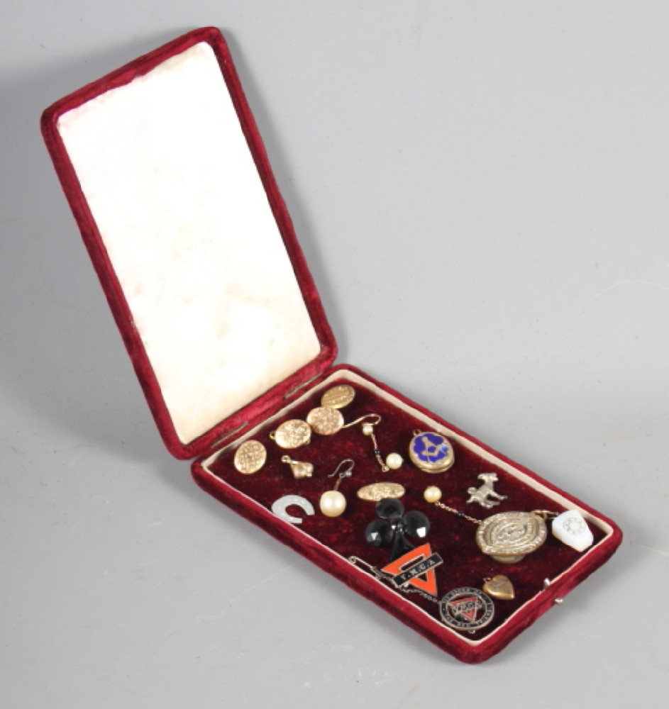 A Masonic? engraved hardstone jewel, a Masonic enamelled pendant/locket, a number of gold faced