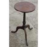 An oak and mahogany top occasional table, on vase column and splay supports, 13 1/2" dia