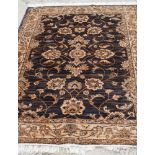 A Ziegler style rug in blue and beige, 74" x 52" approx
