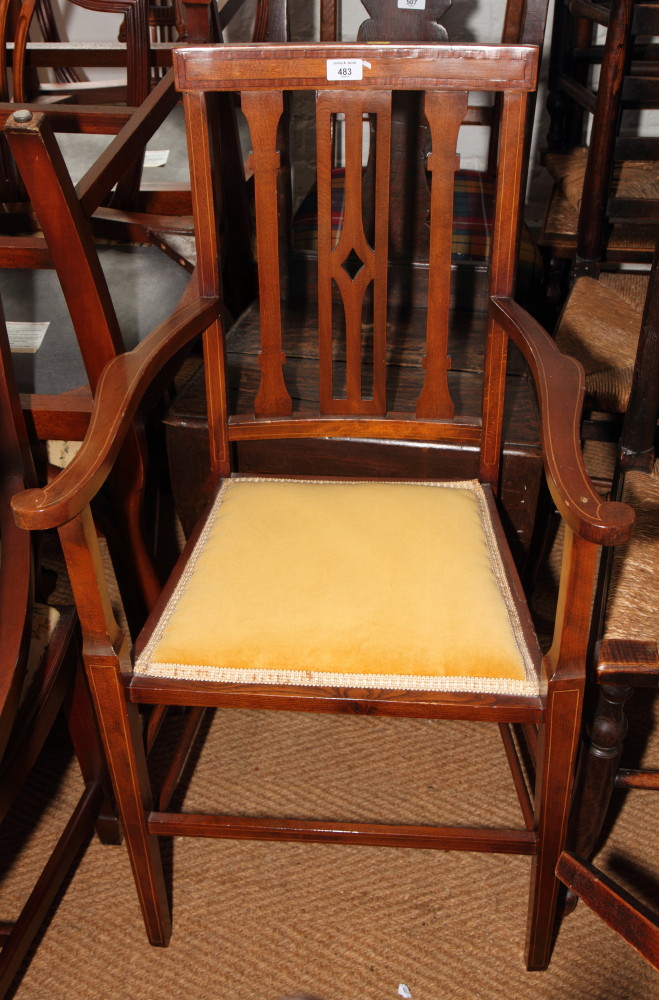 A 19th Century line inlaid armchair, the seat upholstered in a gold fabric, and a 19th Century