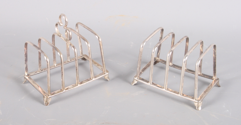 Two silver four-division toast racks, 2oz troy approx