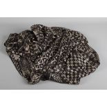 A 1930's black lace and metal mounted shawl
