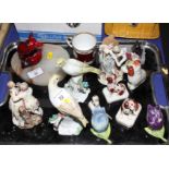 A collection of 19th Century birds and figures, three Staffordshire spaniels, a fox ashtray, an onyx