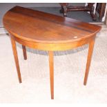 A 19th Century mahogany semicircular side table, on square supports, 39" dia