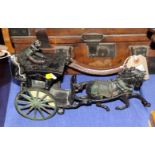 A cast iron and painted model of a hackney carriage, 12" long