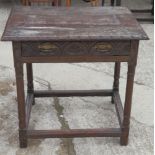 A 17th Century oak side table with carved edge, frieze drawer carved lunettes, on turned underframe,