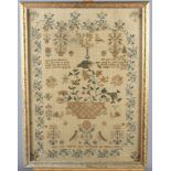 A mid 19th Century needlepoint sampler by Mary Ann Waller... 1843, in strip frame