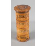 A 19th Century four-tier turned boxwood spice tower, 8" high