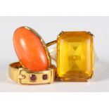 A 9ct gold dress ring set single yellow stone, an 18ct gold buckle ring and a gold dress ring set