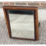 An Edwardian line inlaid mahogany dressing mirror with scroll shaped supports and another