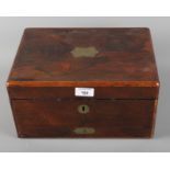 A 19th Century rosewood workbox with fitted interior and jewellery drawer below, 12" wide
