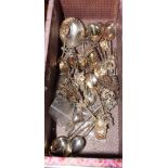 An assortment of Chinese white metal and other Chinese spoons together with an assortment of