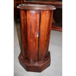 A Victorian circular mahogany pot cupboard with fluted sides and top inset marble panel, 15" dia