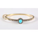 A French 18ct gold, diamond and turquoise hinged bangle