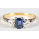 An 18ct gold, diamond and sapphire three-stone dress ring, size O