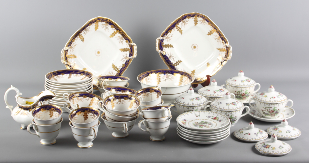 A quantity of 19th Century porcelain tea and coffee wares decorated navy and gilt, together with