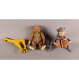 An early 20th Century Steiff teddy bear with replacement pads and much loved, 9 1/2" high, and two