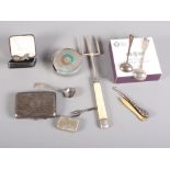 A silver cigarette case, three silver mustard spoons, a pair of silver cufflinks, a silver and ivory